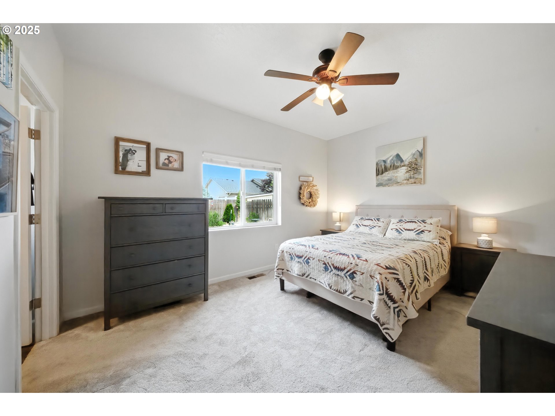 1908 Southwest 2nd Drive Pendleton, OR 97801 - Photo 24 of 40 a bedroom with a bed and a chandelier