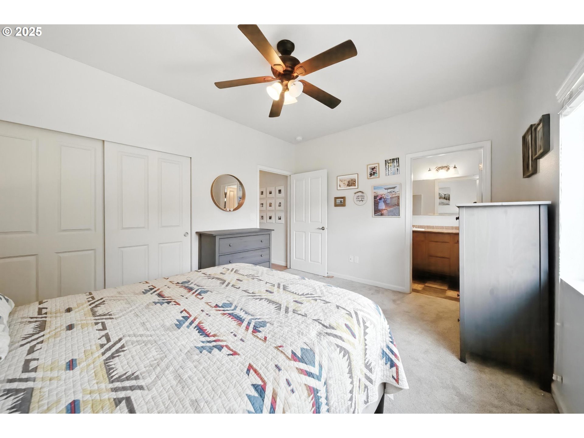 1908 Southwest 2nd Drive Pendleton, OR 97801 - Photo 26 of 40 a bedroom with a bed and a ceiling fan
