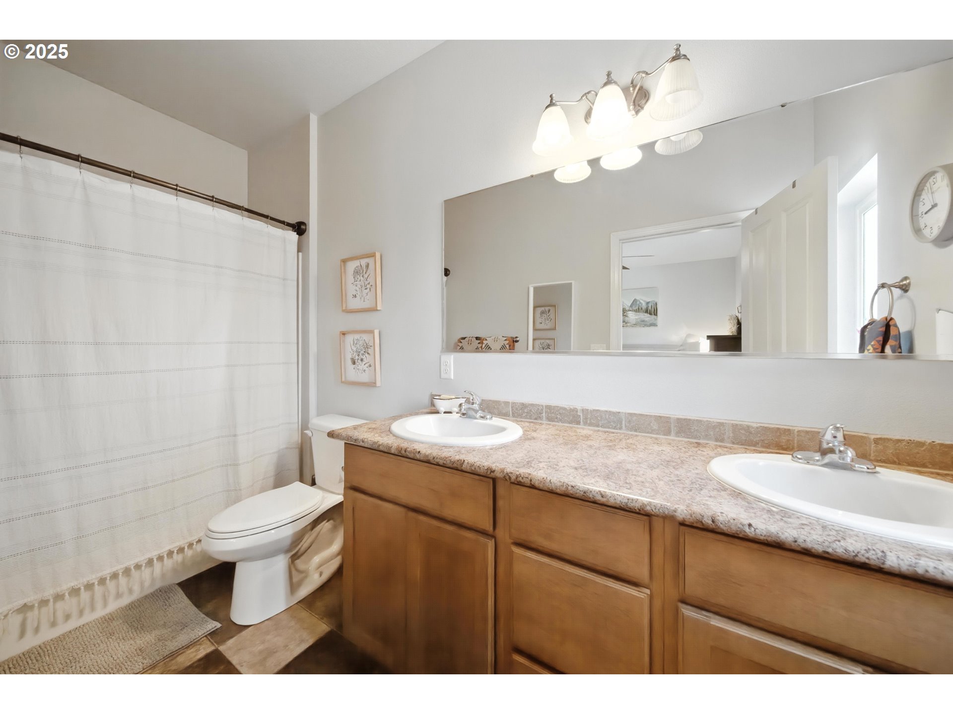 1908 Southwest 2nd Drive Pendleton, OR 97801 - Photo 27 of 40 a bathroom with a granite countertop sink a toilet and a mirror