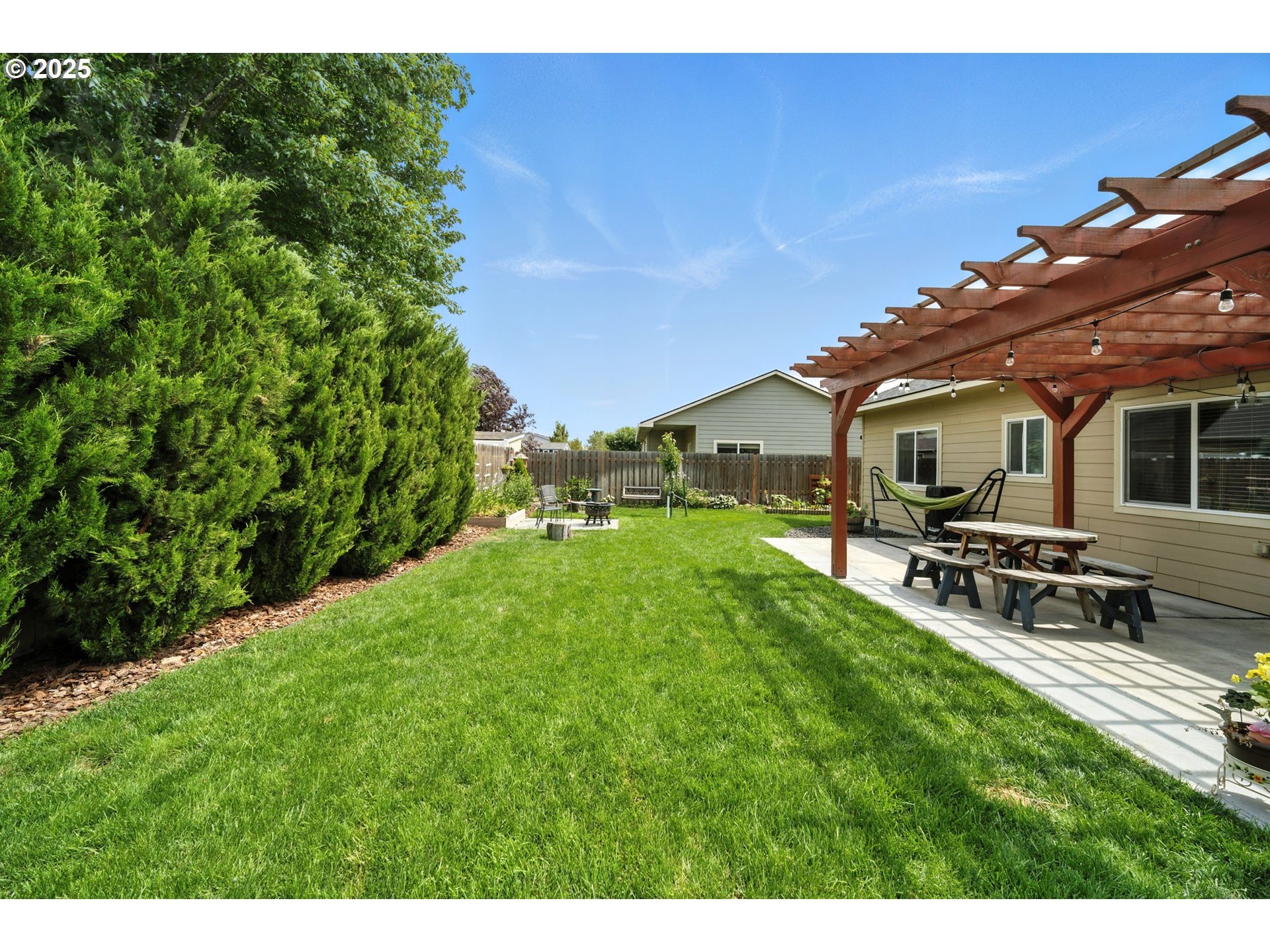 1908 Southwest 2nd Drive Pendleton, OR 97801 - Photo 34 of 40 a view of a house with backyard and sitting area