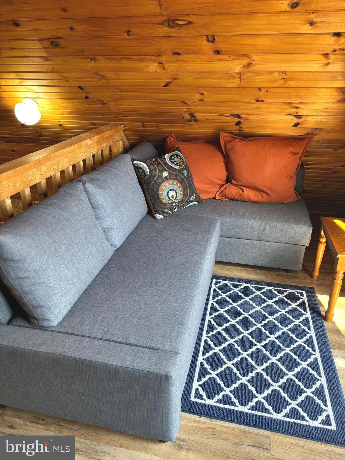 6751 High Knob Road Old Fields, WV 26845 - Photo 15 of 26 a bedroom with a bed and a night stand