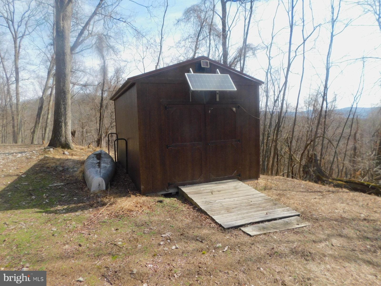 6751 High Knob Road Old Fields, WV 26845 - Photo 21 of 26 a view of a backyard of the house