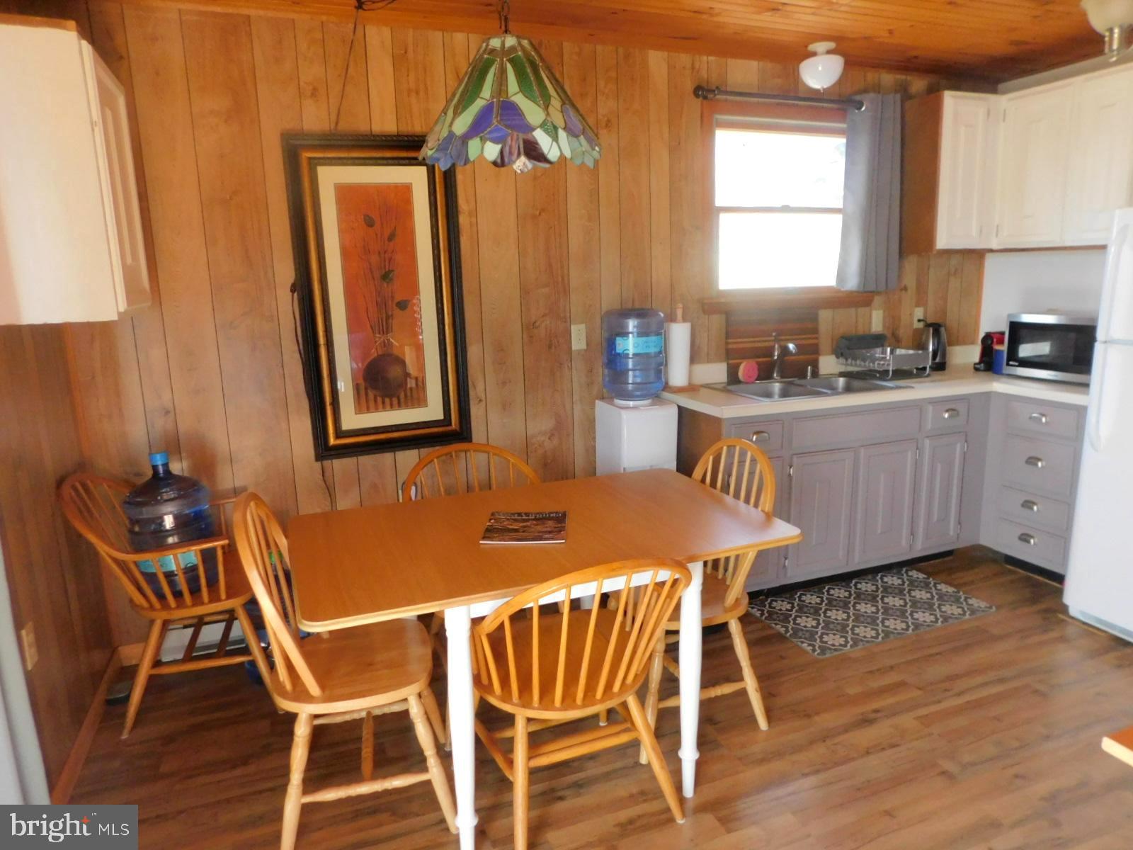 6751 High Knob Road Old Fields, WV 26845 - Photo 7 of 26 a dining room with furniture and window