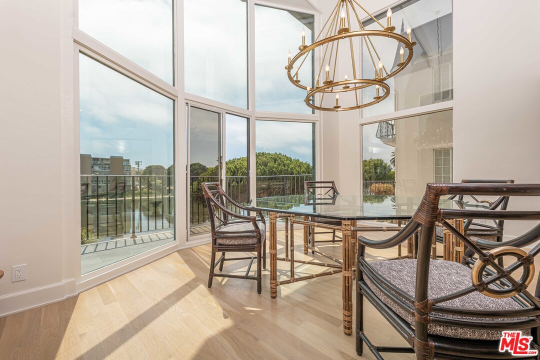 6501 Esplanade Playa del Rey, CA 90293 - Photo 14 of 54 a view of a dining room with furniture water and chandelier