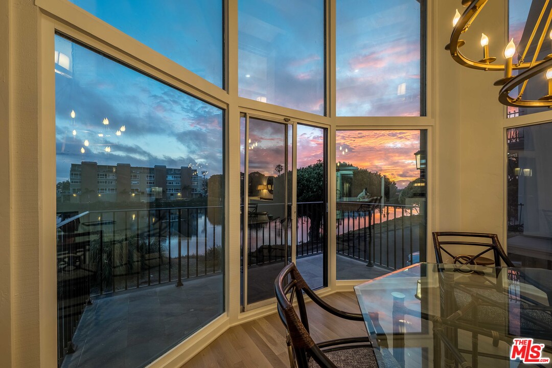 6501 Esplanade Playa del Rey, CA 90293 - Photo 3 of 54 a dining room with furniture and a floor to ceiling window