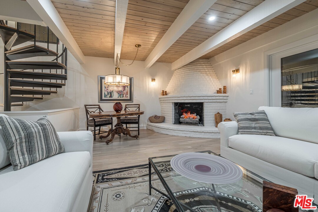 6501 Esplanade Playa del Rey, CA 90293 - Photo 24 of 54 a living room with furniture and a fireplace