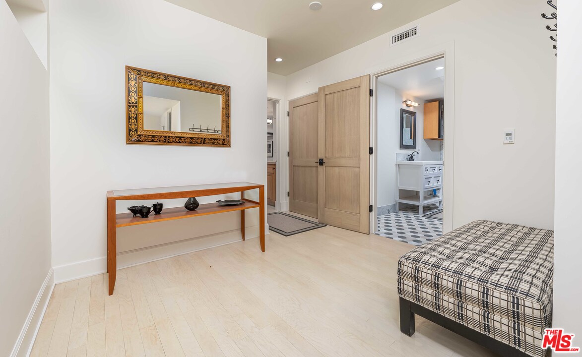 6501 Esplanade Playa del Rey, CA 90293 - Photo 36 of 54 a bedroom with a bed and a table in it