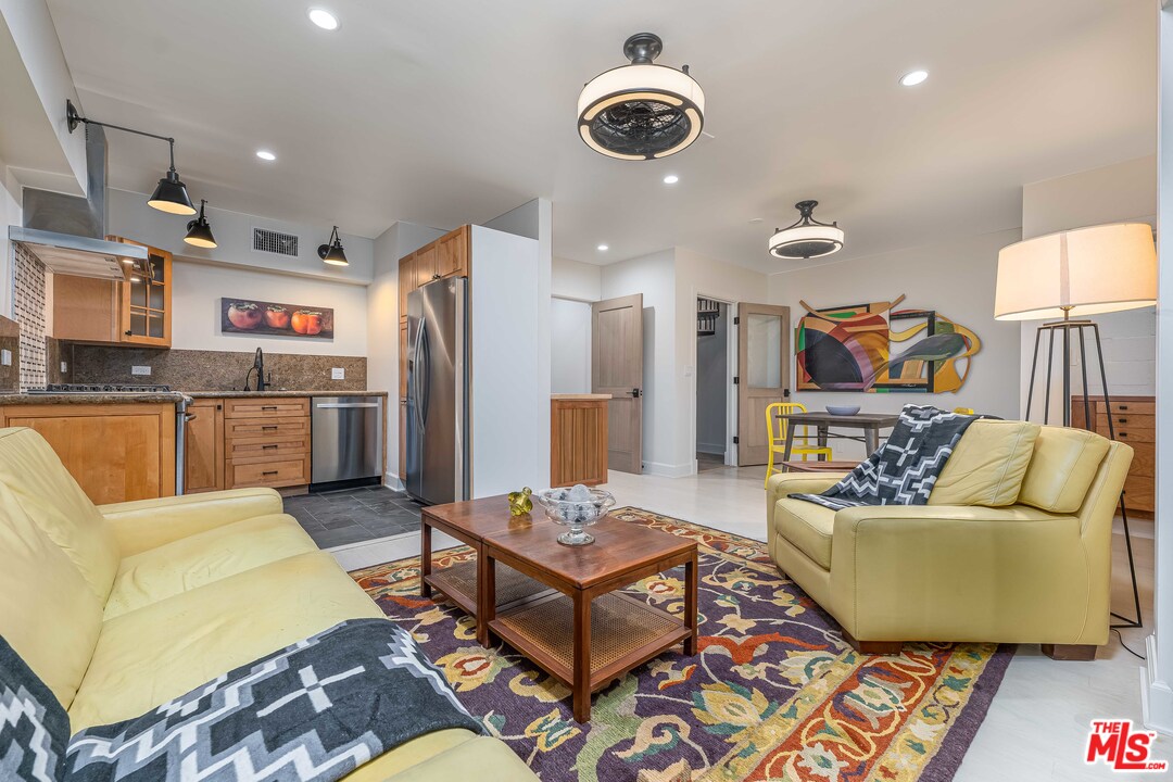 6501 Esplanade Playa del Rey, CA 90293 - Photo 38 of 54 a living room with furniture and a wooden floor