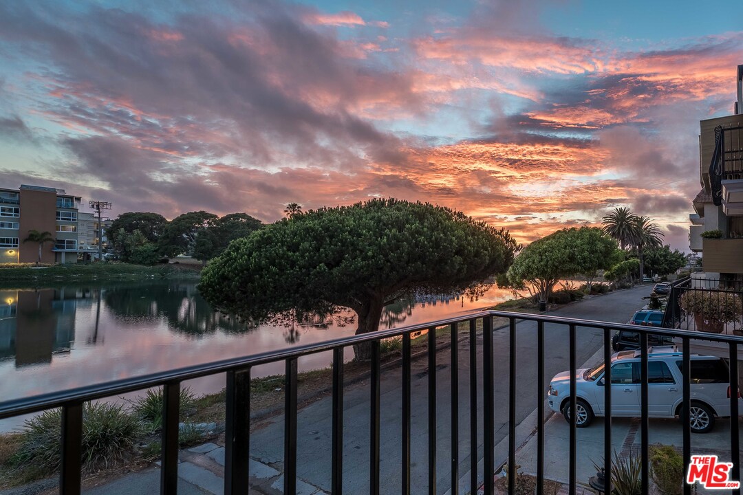 6501 Esplanade Playa del Rey, CA 90293 - Photo 45 of 54 a balcony with wooden floor and lake view
