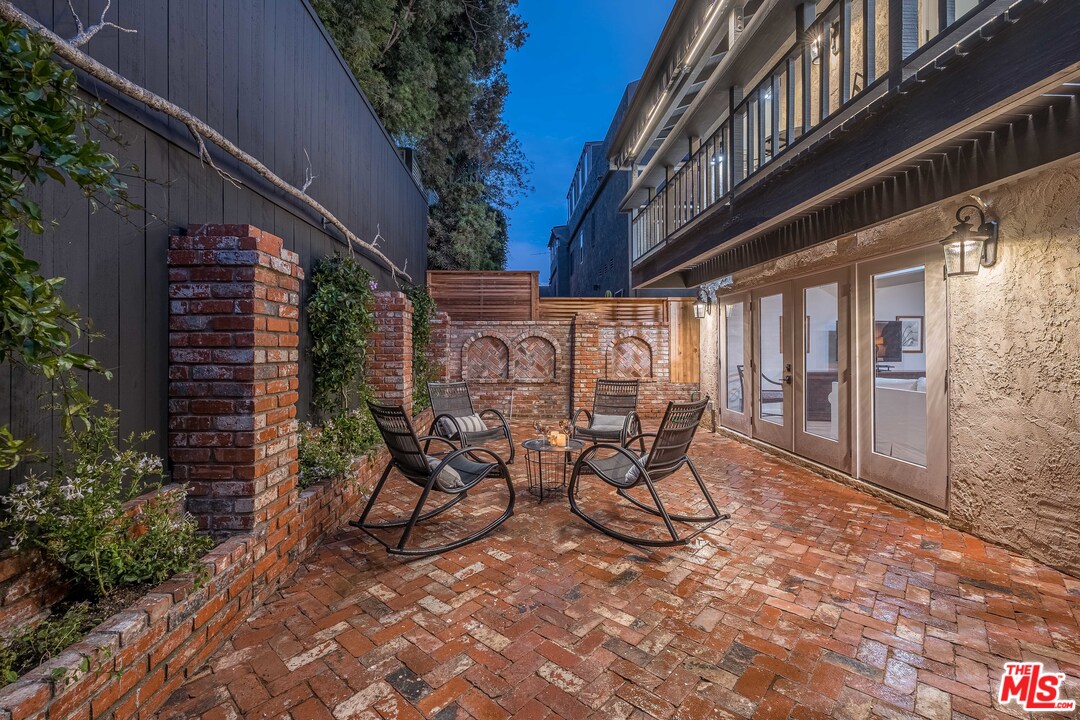 6501 Esplanade Playa del Rey, CA 90293 - Photo 47 of 54 a view of patio with a table and chairs and potted plants