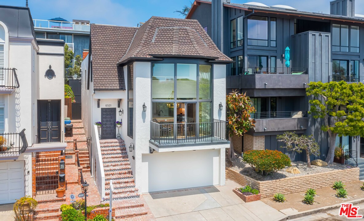 6501 Esplanade Playa del Rey, CA 90293 - Photo 10 of 54 a front view of a house with glass windows