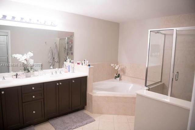 8395 Southwest 73rd Avenue, Unit 105 Miami, FL 33143 - Photo 12 of 14 a bathroom with a tub sink and mirror