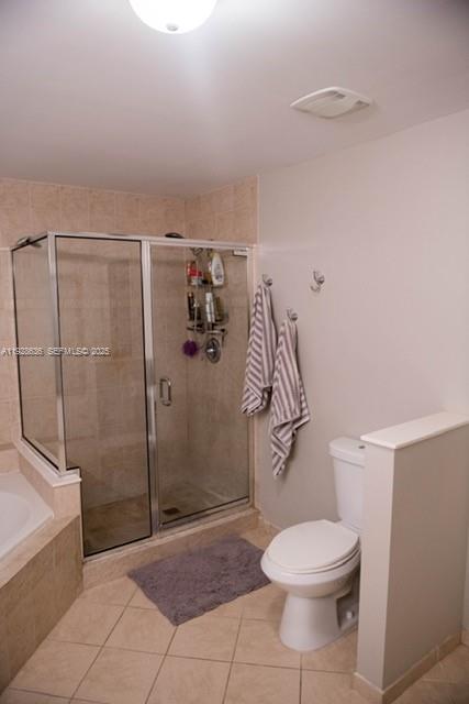 8395 Southwest 73rd Avenue, Unit 105 Miami, FL 33143 - Photo 13 of 14 a bathroom with a toilet and shower