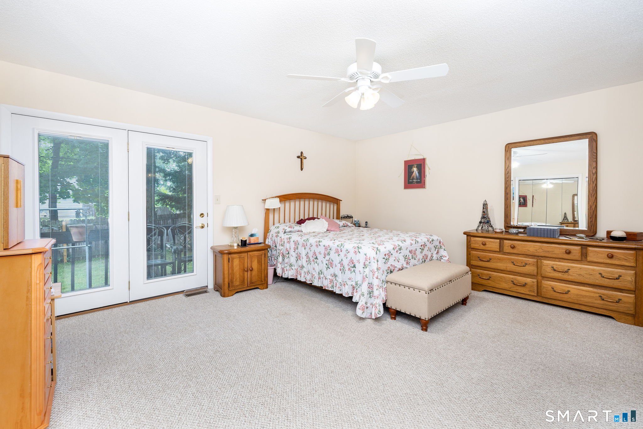 186 Main Street, Unit B Manchester, CT 06042 - Photo 10 of 26 Primary bedroom with french doors to deck