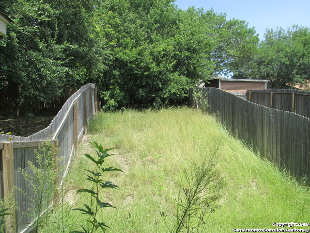 10003 Vasso View, Unit 4 Converse, TX 78109 - Photo 10 of 10 a view of a garden