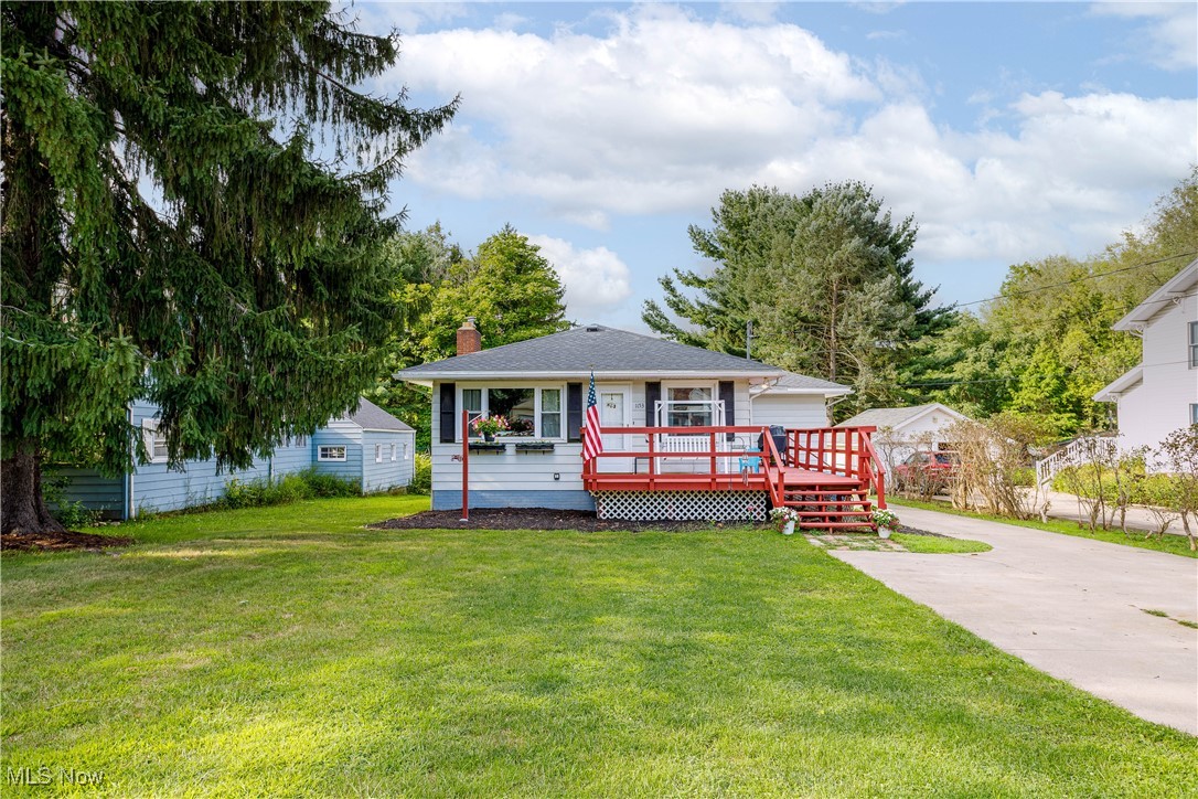1153 Krumroy Road Akron, OH 44306 - Photo 2 of 26 View of front of home featuring a front lawn and a wooden deck