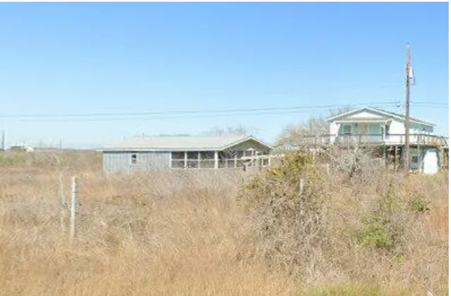 a view of a lake with a big yard