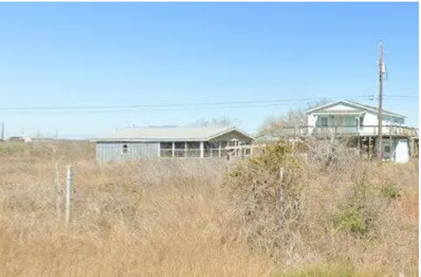 a view of a lake with a big yard