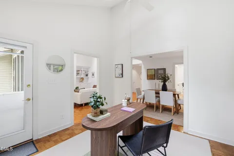 a view of a livingroom with furniture and wooden floor