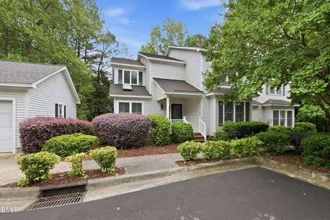 an aerial view of a house with a garden