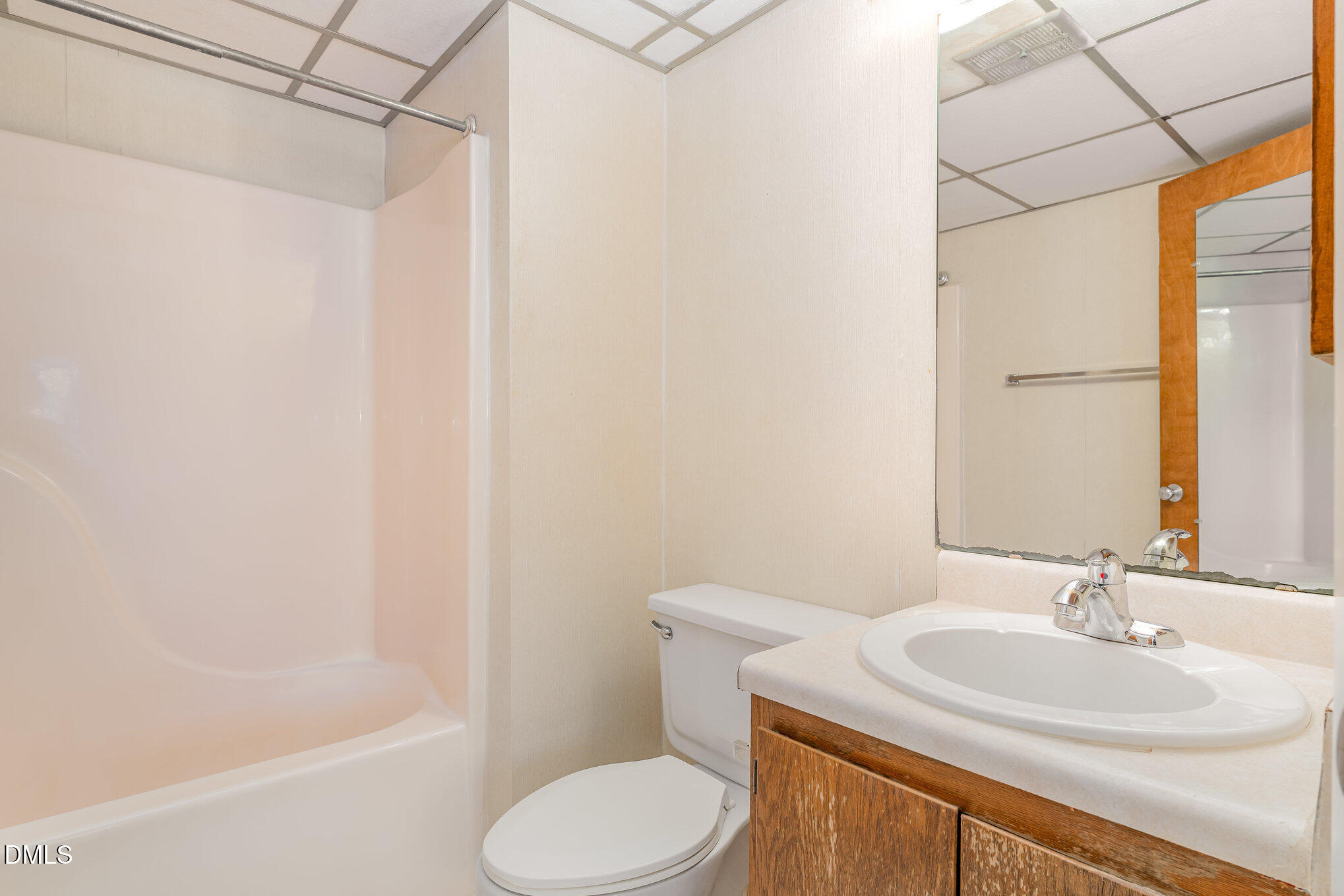 4700 Westgrove Street, Unit 216 Raleigh, NC 27606 - Photo 14 of 21 a bathroom with a sink toilet and shower