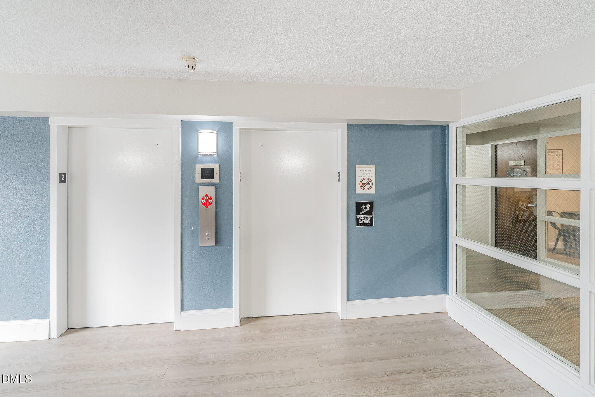 4700 Westgrove Street, Unit 216 Raleigh, NC 27606 - Photo 3 of 21 an empty room with entrance and windows