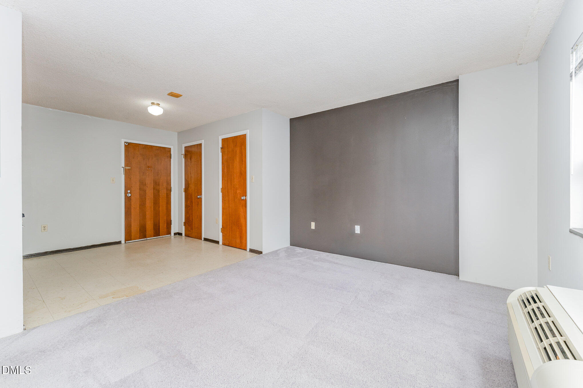 4700 Westgrove Street, Unit 216 Raleigh, NC 27606 - Photo 6 of 21 a view of an empty room with a window