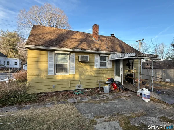 a front view of a house with a garage