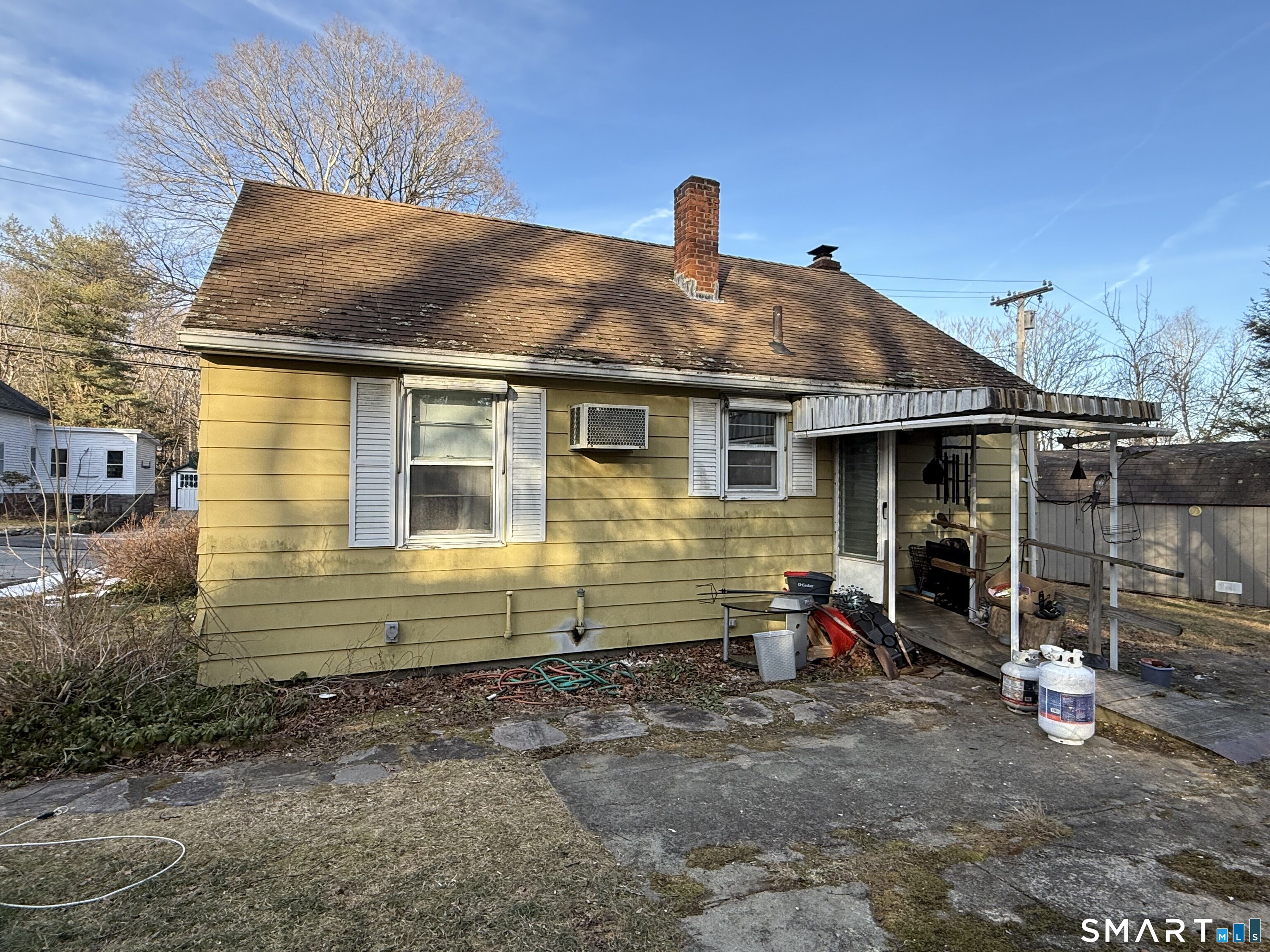 40 Beech Street Norwich, CT 06360 - Photo 6 of 8 a front view of a house with a garage