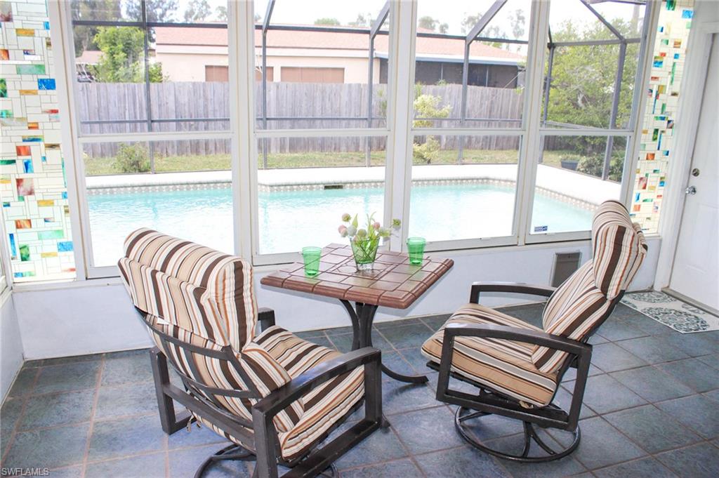 18584 Sebring Road Fort Myers, FL 33967 - Photo 18 of 25 Sunroom featuring a healthy amount of sunlight
