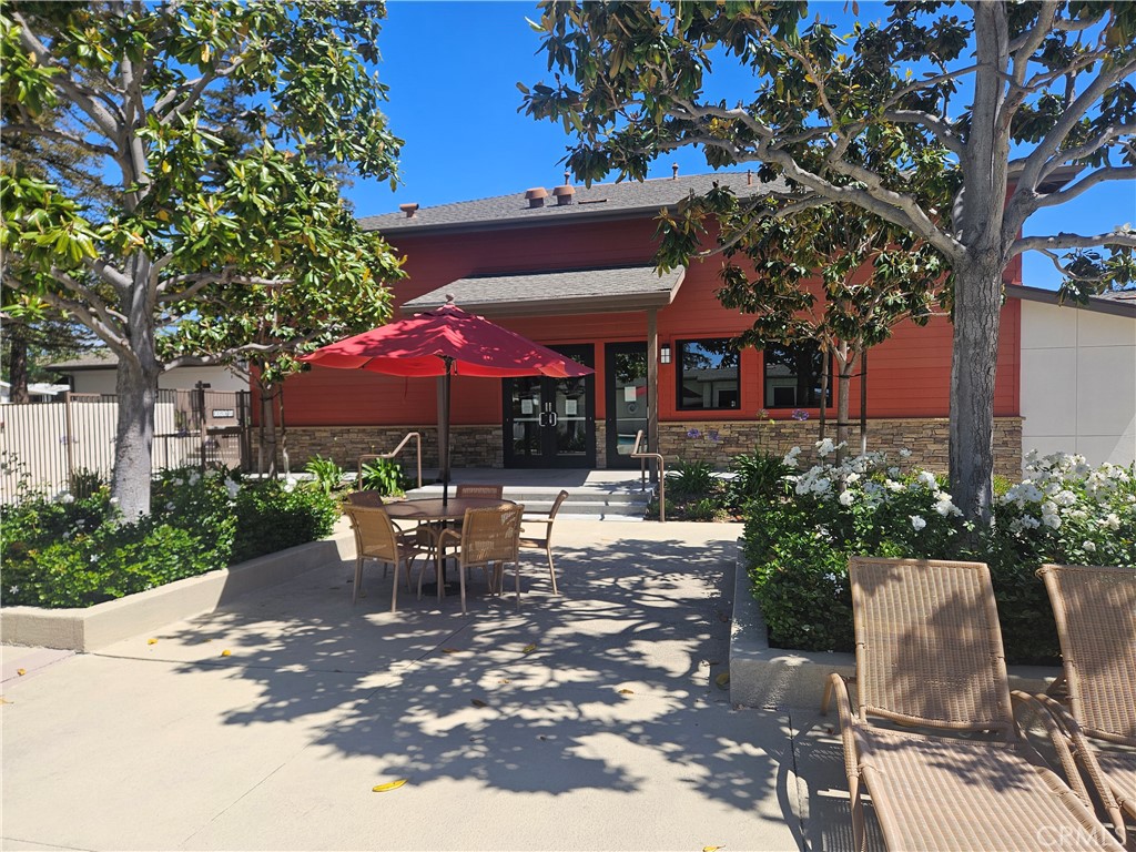 14851 Jeffrey Road, Unit 171 Irvine, CA 92618 - Photo 38 of 40 Outdoor patio pool area near kitchen