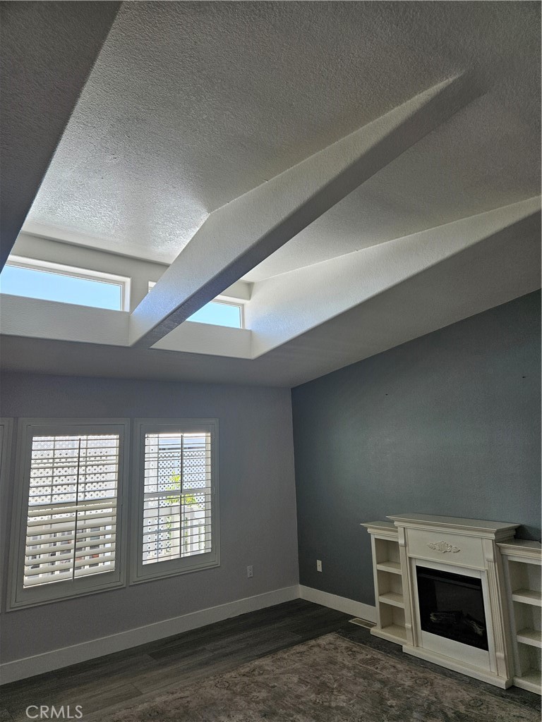 14851 Jeffrey Road, Unit 171 Irvine, CA 92618 - Photo 5 of 40 Living room skylight