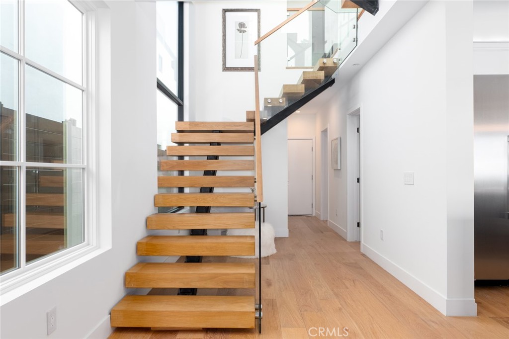 1025 West Balboa Boulevard Newport Beach, CA 92661 - Photo 11 of 70 a view of entryway and hall with wooden floor