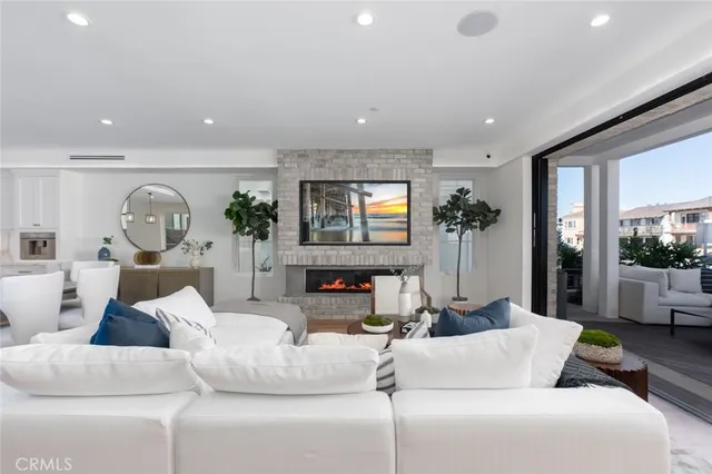 a kitchen with a sink a counter space appliances and a center island