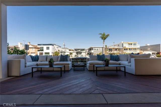 a spacious bedroom with a bed and couch