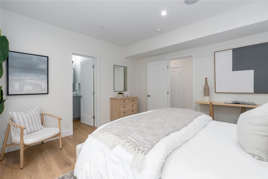 1025 West Balboa Boulevard Newport Beach, CA 92661 - Photo 30 of 70 a spacious bedroom with a bed and couch