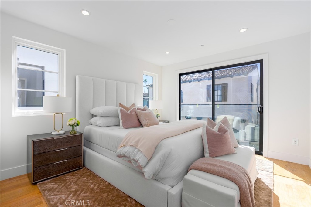 1025 West Balboa Boulevard Newport Beach, CA 92661 - Photo 34 of 70 a bedroom with a bed and a large window