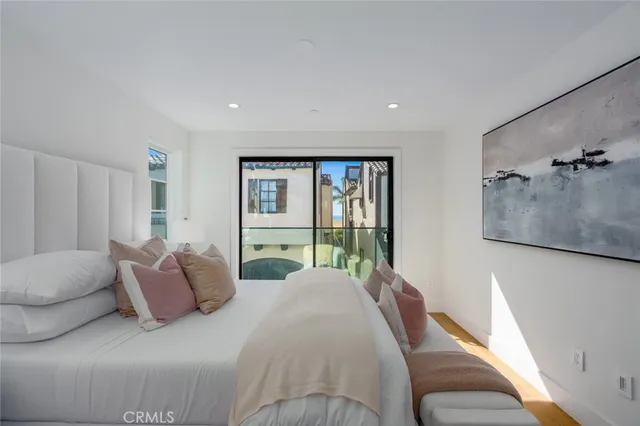 a living room with furniture flowerpot and a fireplace