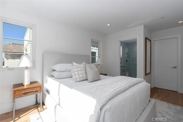 a view of staircase with railing and chandelier