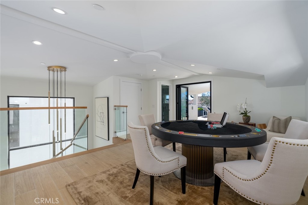 1025 West Balboa Boulevard Newport Beach, CA 92661 - Photo 59 of 70 a view of a dining room with furniture and wooden floor