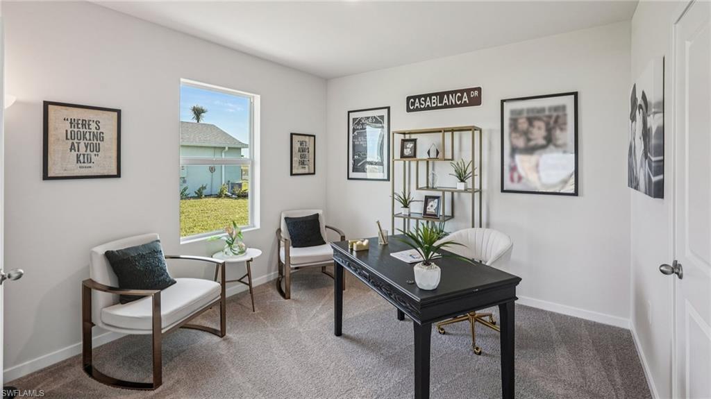 17584 Shade Tree Loop Punta Gorda, FL 33982 - Photo 10 of 35 Bright room with neutral wall paint and textured carpeting