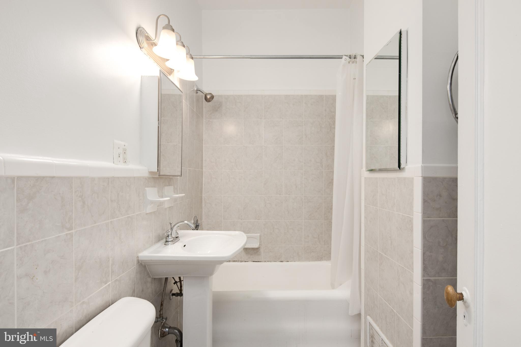 1613 Harvard Street Northwest, Unit 102 Washington, DC 20009 - Photo 14 of 18