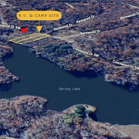 a view of a pool with a yard