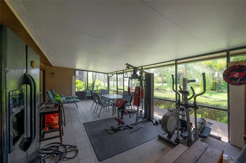 a view of a backyard with a fountain
