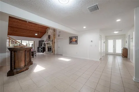 a view of a hallway with seating area