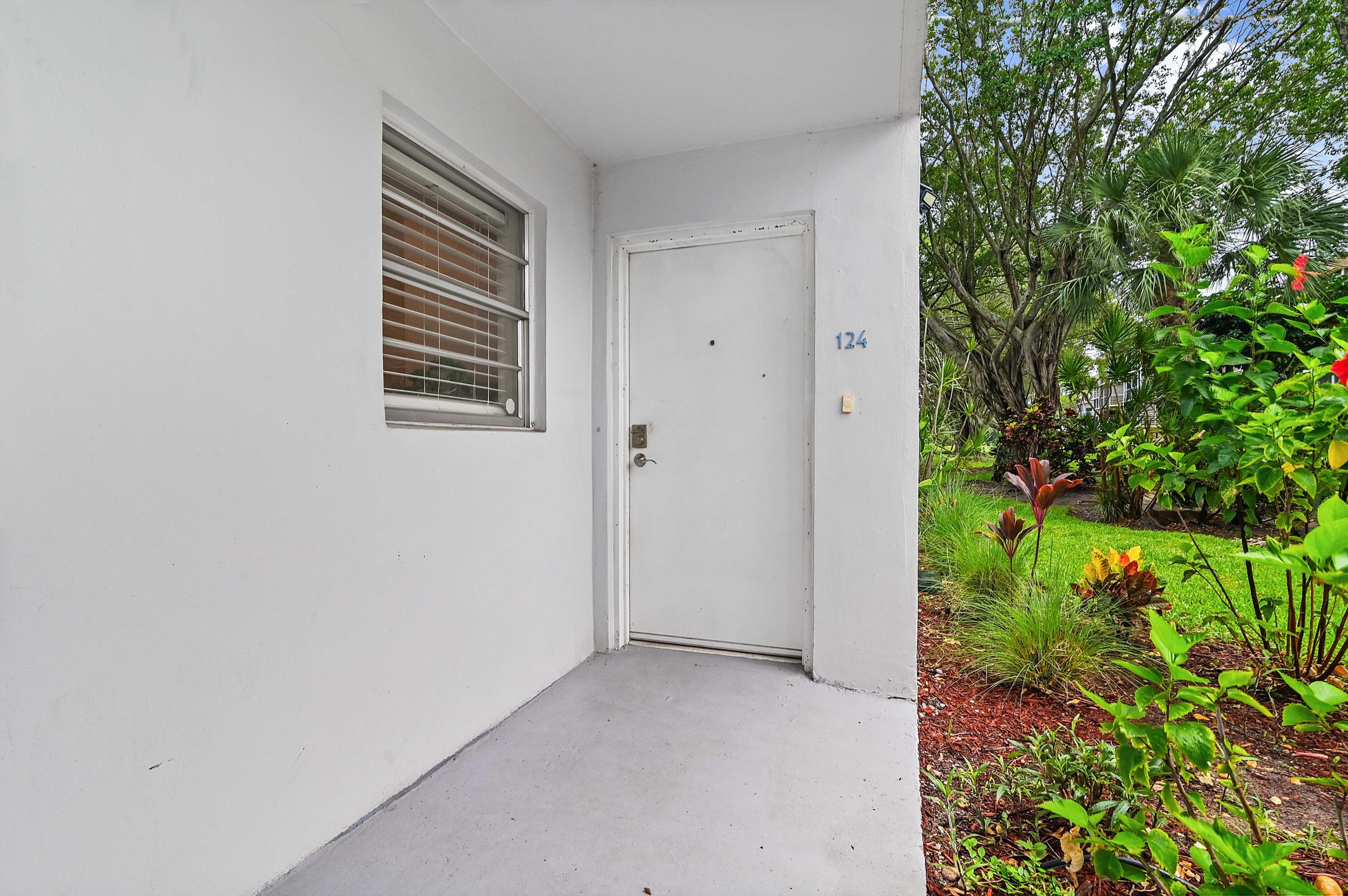 6400 Northwest 2nd Avenue, Unit 124 Boca Raton, FL 33487 - Photo 5 of 33 a view of balcony and yard