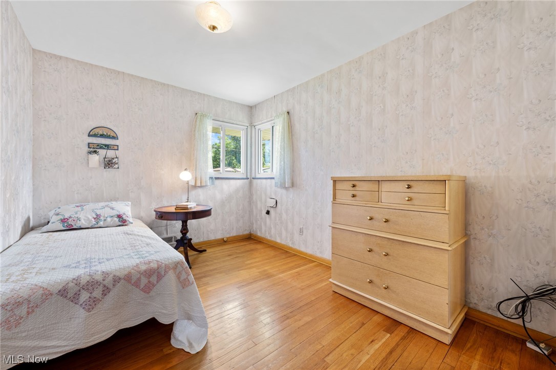 7702 Ragall Parkway Cleveland, OH 44130 - Photo 21 of 41 Bedroom featuring light hardwood / wood-style floors