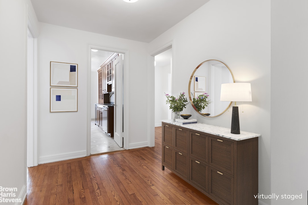 353 West 56th Street, Unit 9F Manhattan, NY 10019 - Photo 5 of 10 a view of a sink and mirror