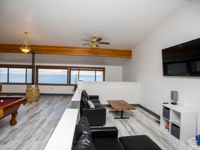 588 Raspberry Patch Road Garden City, UT 84028 - Photo 50 of 74 Living area with pool table, light wood finished floors, and ceiling fan