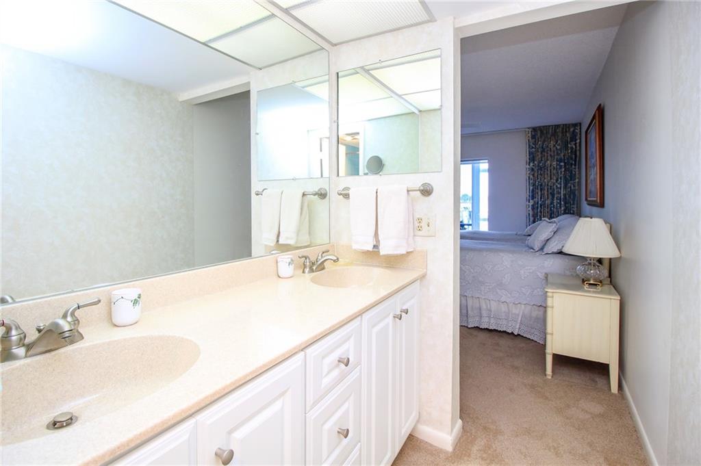 1868 Southwest Palm City Road, Unit 105 Stuart, FL 34994 - Photo 15 of 48 Master Bath view to Bedroom